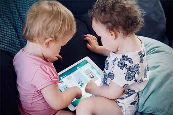 Babies using a tablet